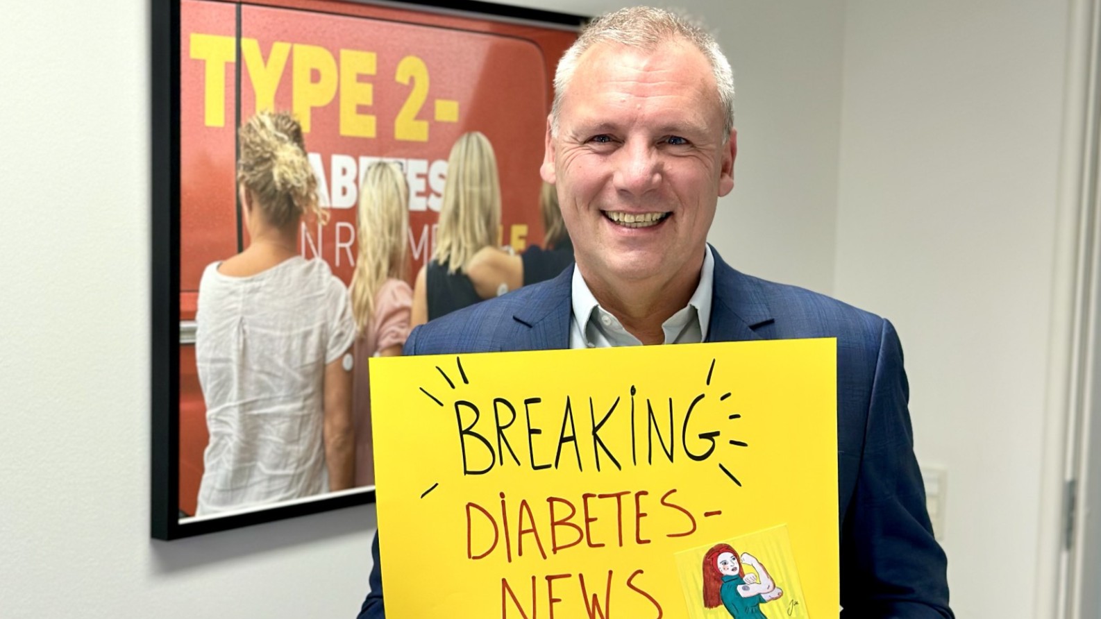 Claus Richter med "breaking diabetes news" skilt